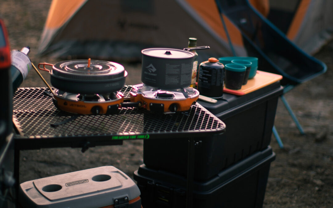 Camp Kitchen set up with a stove and pots